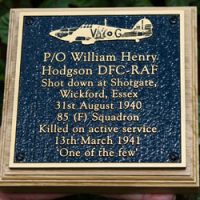 Bronze War Memorial on a Backing Board