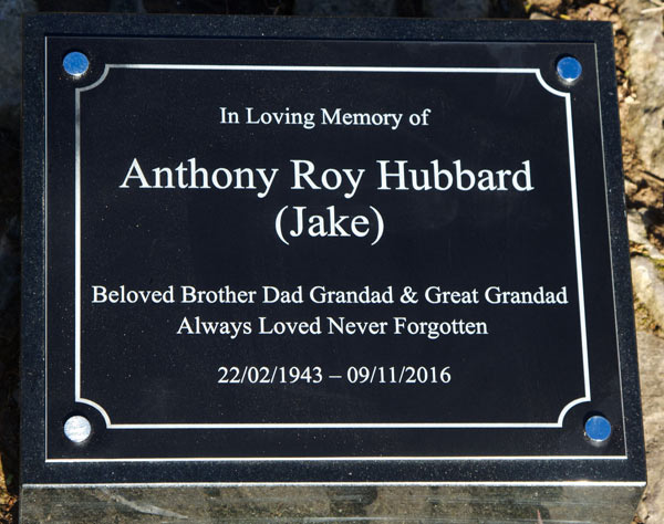 Black anodised aluminium plaque on a black granite wedge. Black anodised aluminium plaque on a black granite wedge.