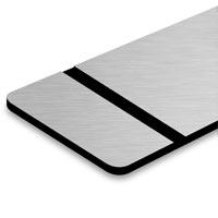 Brushed silver surface with black lettering. Brushed silver surface with black lettering.