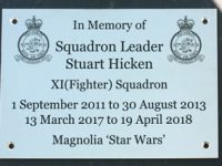 Engraved brass plaque.