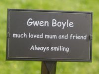 Plaque in a plaque holder.