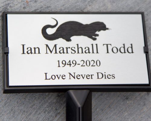 Plaque holder with a plaque. Plaque holder with a plaque.