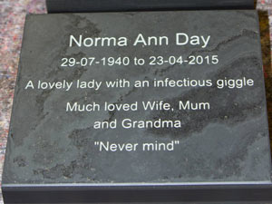 Slate memorial with lichen green lettering Slate memorial with lichen green lettering